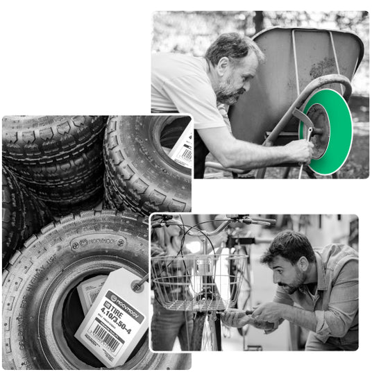 men repairing the wheels of their wheelbarrow or bicycle